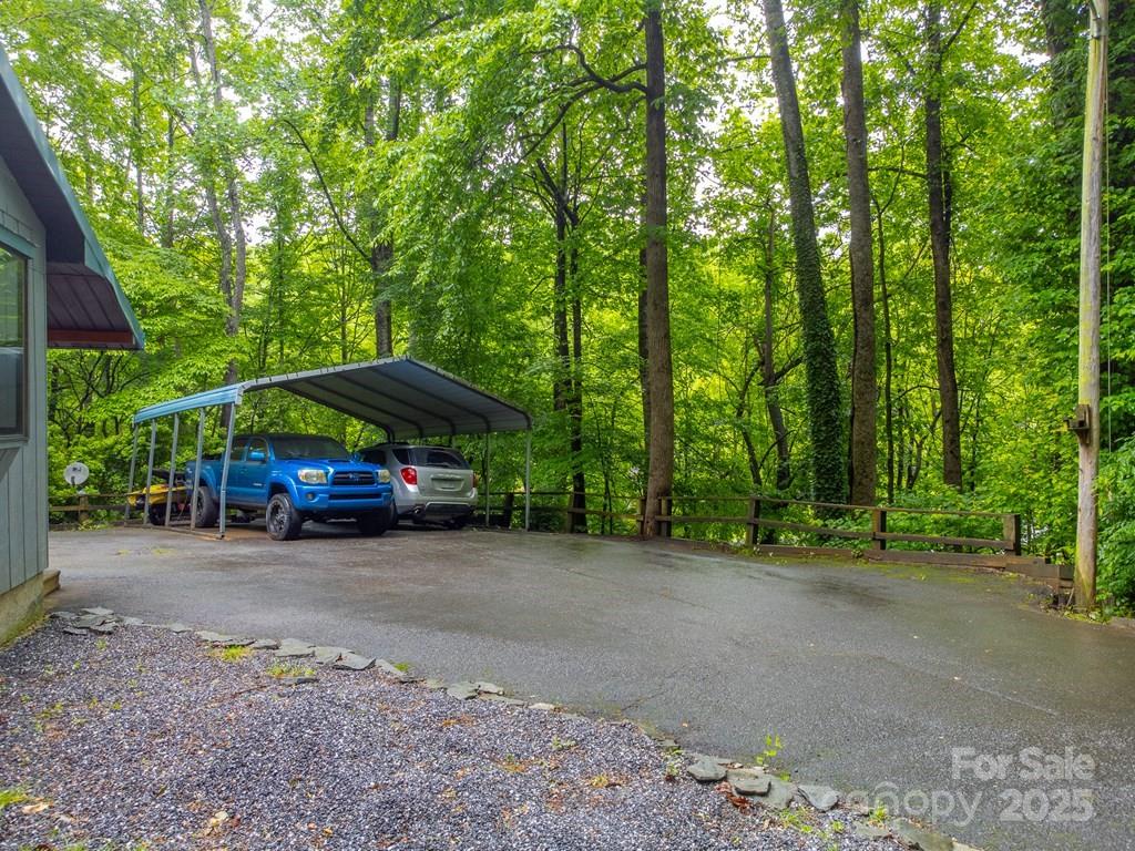 302 Mitchell Road Sylva, NC 28779 - Photo 40 of 48 a view of a street with a car parked in front of it
