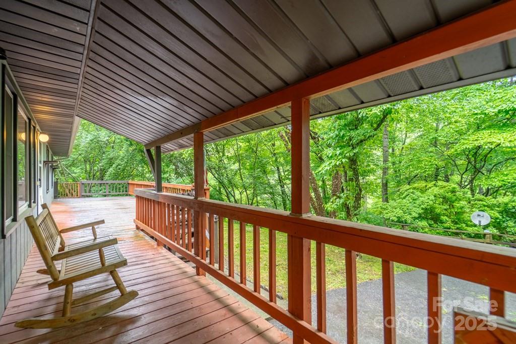 302 Mitchell Road Sylva, NC 28779 - Photo 4 of 48 a view of a chairs and table in the balcony