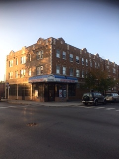 5304 West Division Street, Unit G Chicago, IL 60651 - Photo 1 of 5 a view of building with a street