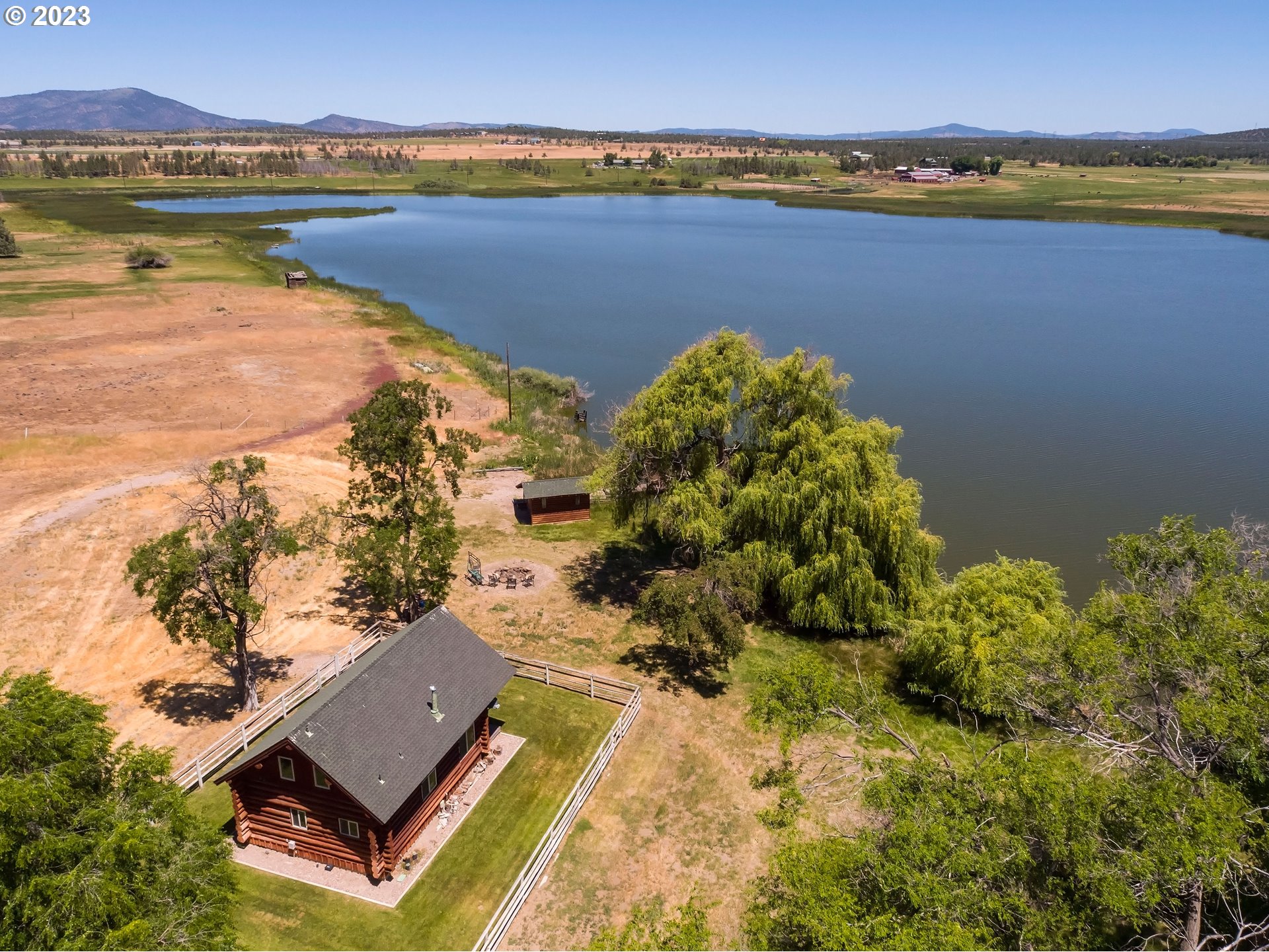 a view of an ocean and city