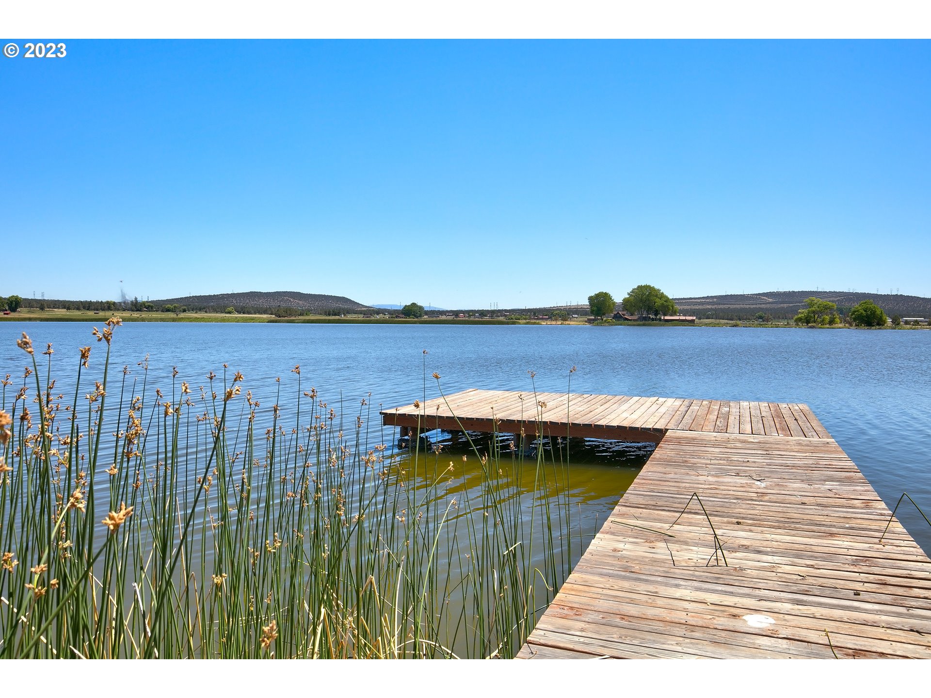 11677 Southwest Houston Lake Road Powell Butte, OR 97753 - Photo 15 of 35 a view of balcony with furniture
