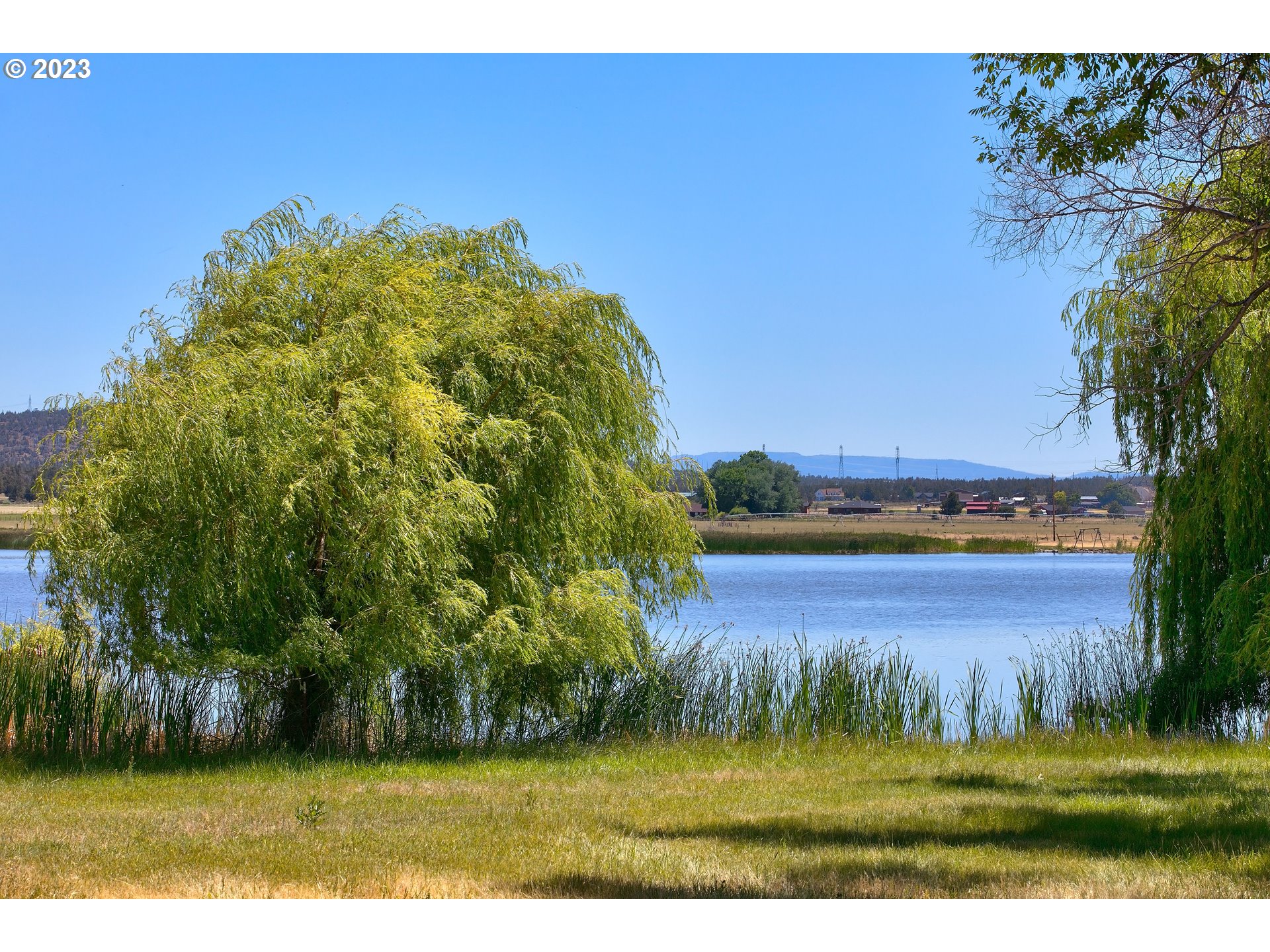 11677 Southwest Houston Lake Road Powell Butte, OR 97753 - Photo 19 of 35 a view of a yard