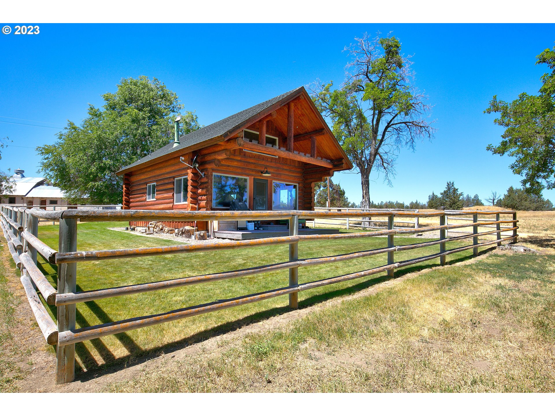 11677 Southwest Houston Lake Road Powell Butte, OR 97753 - Photo 2 of 35 a view of swimming pool with a lounge chair