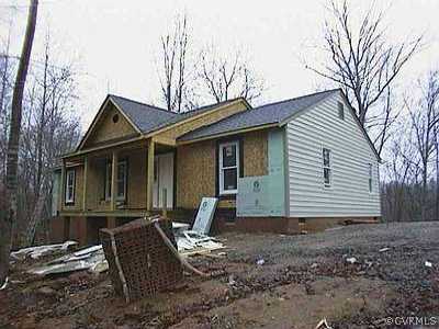 3984 Whitehall Road Sandy Hook, VA 23153 - Photo 1 of 1 a view of house with backyard space and seating