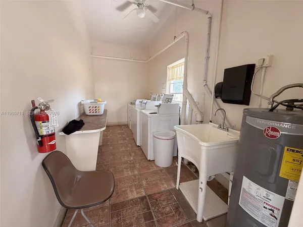 a utility room with dryer and washer