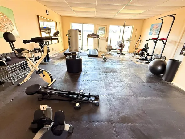 a view of wooden fence next to a yard