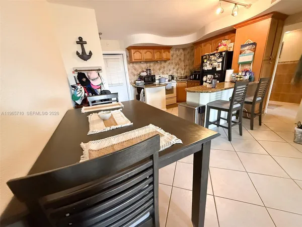 a view of a dining room with furniture