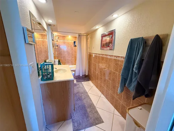 a view of a hallway with windows