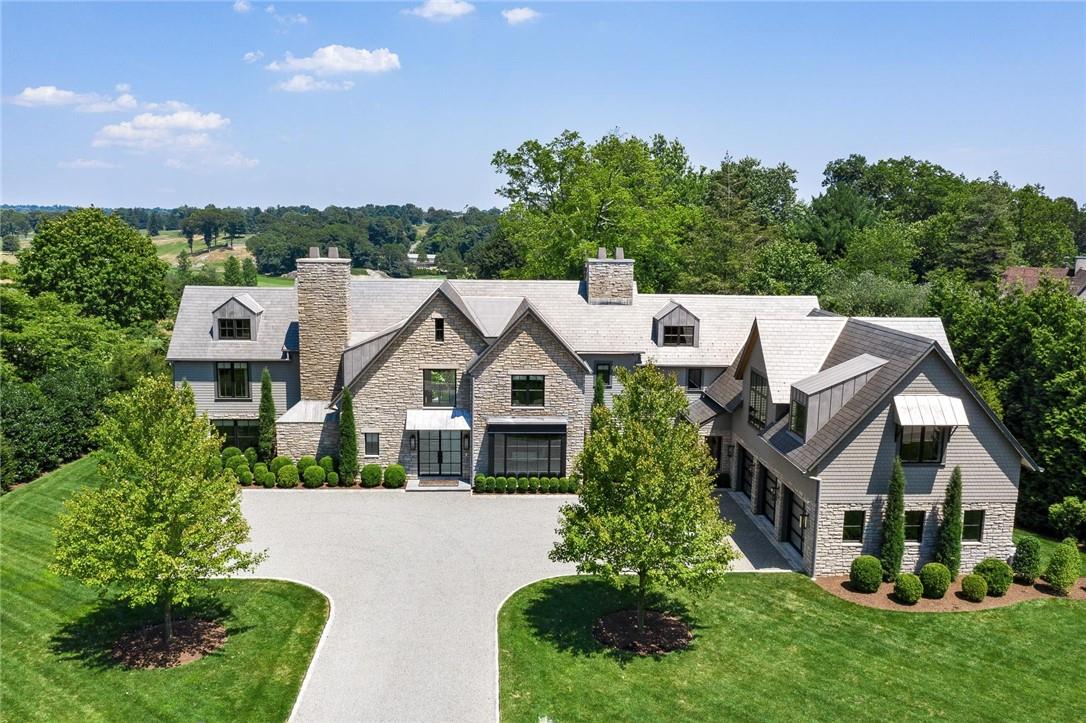 21 Bellevue Avenue Rye, NY 10580 - Photo 1 of 1 front view of a house with a yard
