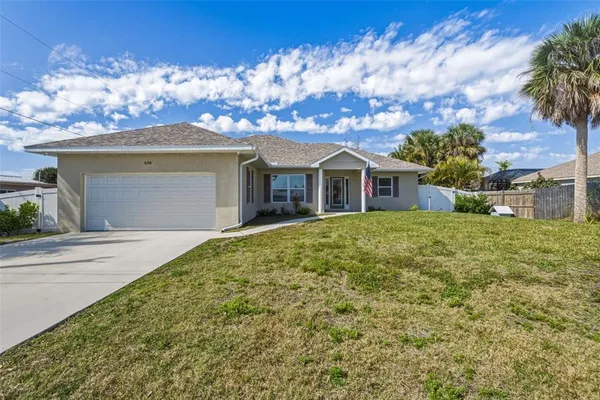 front view of house with a yard