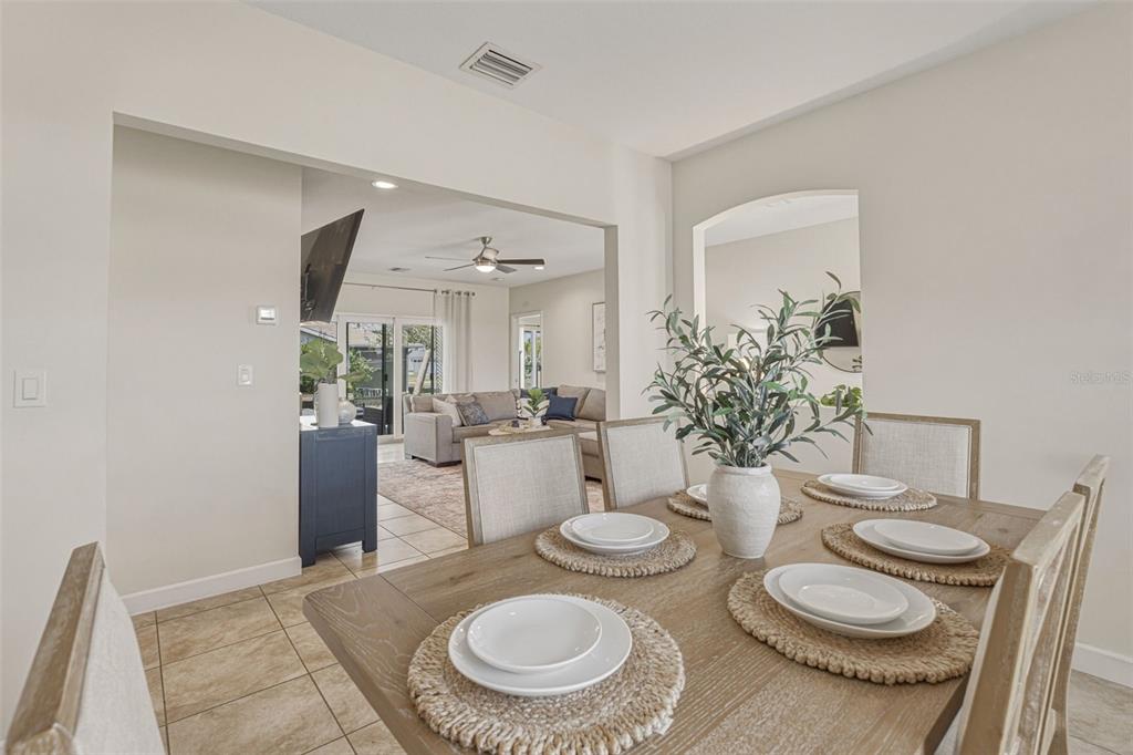 634 Carmel Road Venice, FL 34293 - Photo 14 of 67 a kitchen with a table and chairs in it