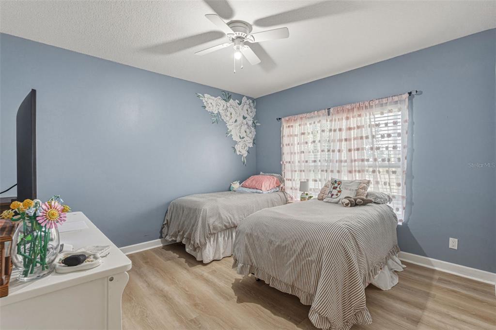 634 Carmel Road Venice, FL 34293 - Photo 36 of 67 a bedroom with a bed and a window