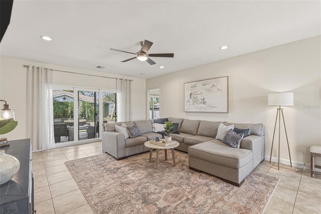 634 Carmel Road Venice, FL 34293 - Photo 7 of 67 a living room with furniture and a large window