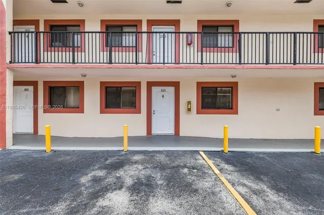 a front view of a house with street