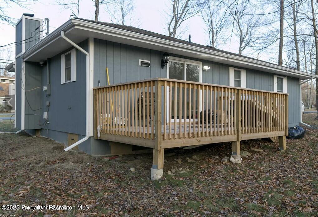 103 Orchard Lane Tobyhanna, PA 18466 - Photo 12 of 12 a view of a house with a yard and deck
