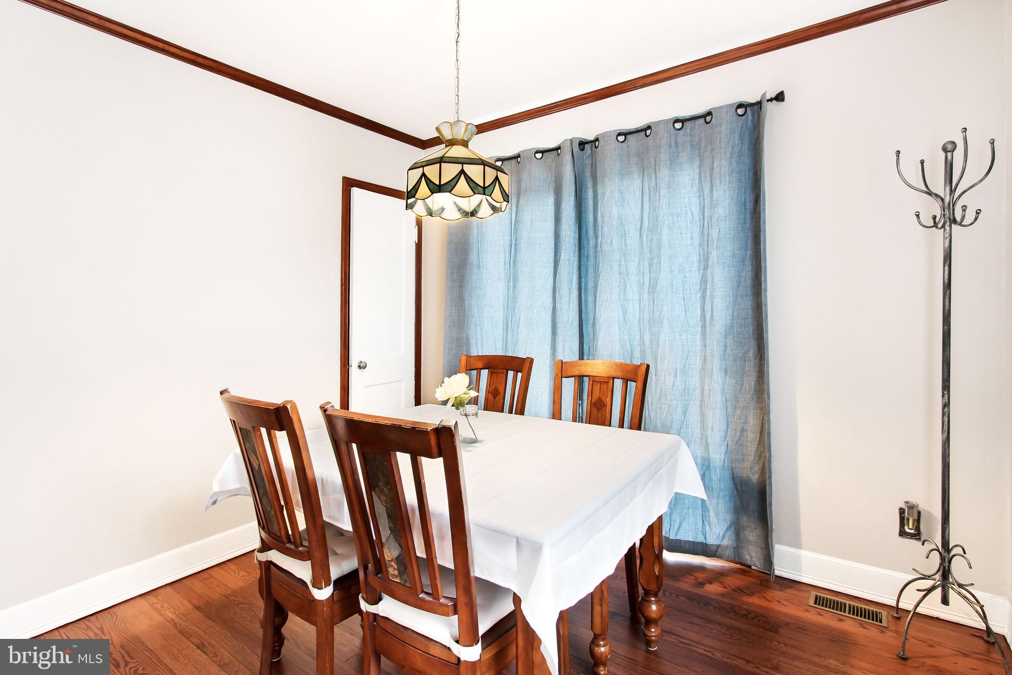 538 West Woodlynn Road Baltimore, MD 21221 - Photo 9 of 26 Dining Room with slider to deck