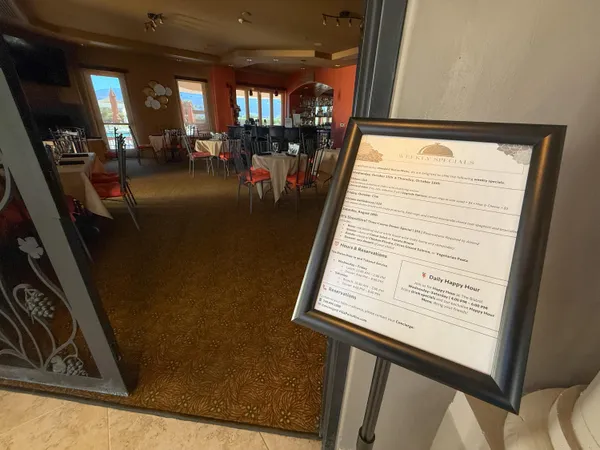 a view of a hallway with living room