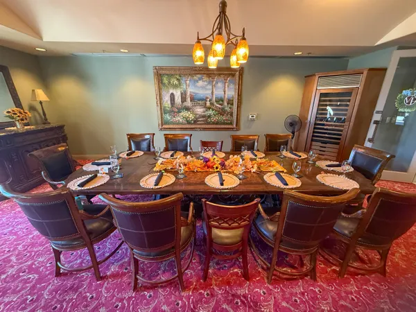 a view of a dining room with furniture