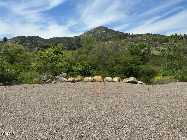 0 Midland Road Poway, CA 92064 - Photo 6 of 9 a view of a dry field with mountains in the background