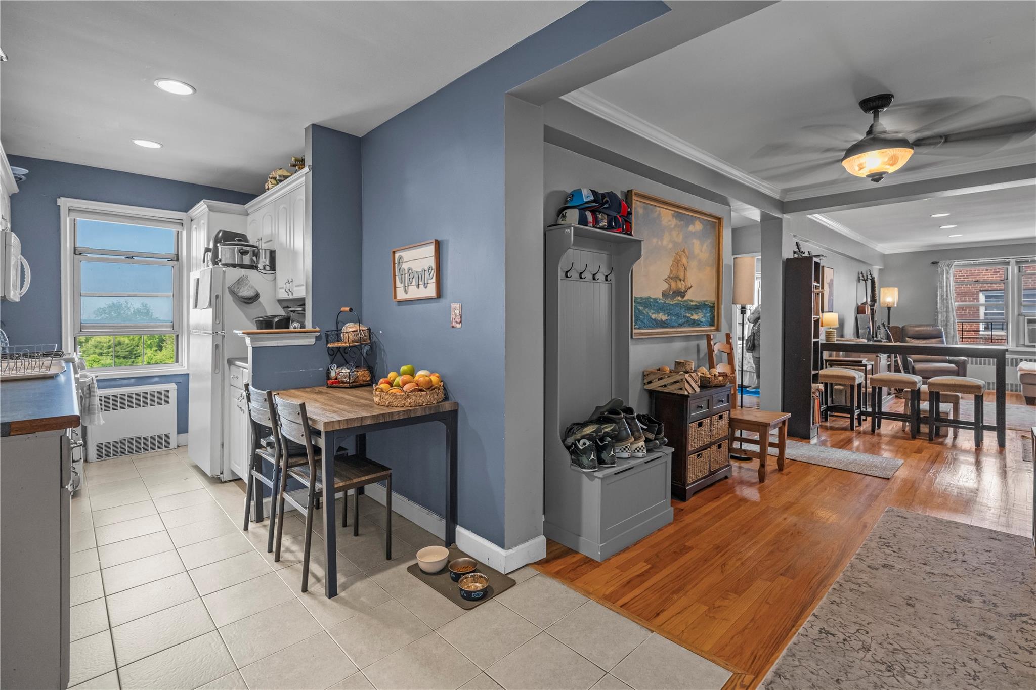 60 Locust Avenue, Unit 610 New Rochelle, NY 10801 - Photo 12 of 22 a living room with dining room and kitchen view