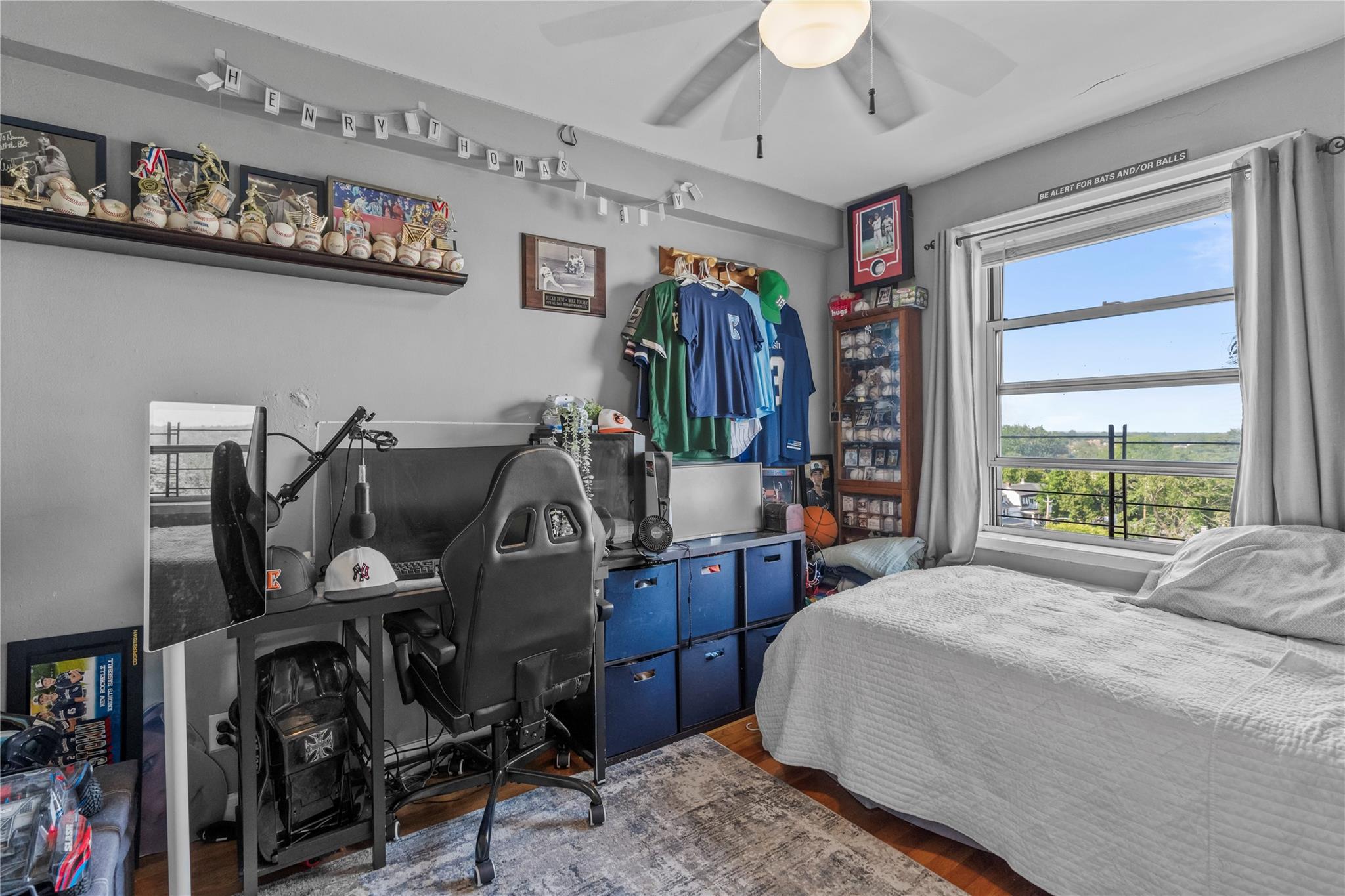 60 Locust Avenue, Unit 610 New Rochelle, NY 10801 - Photo 15 of 22 a bedroom with furniture and a window