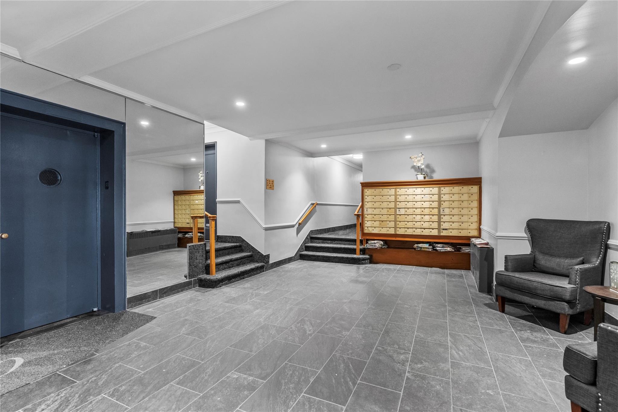 60 Locust Avenue, Unit 610 New Rochelle, NY 10801 - Photo 16 of 22 a living room with furniture gym equipment and a window