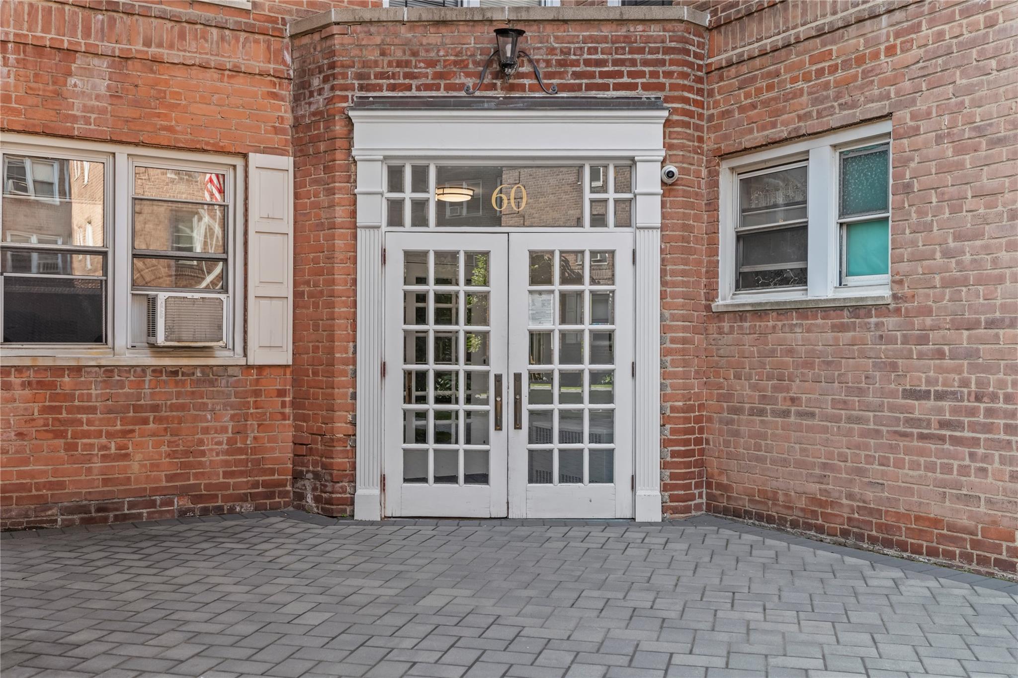 60 Locust Avenue, Unit 610 New Rochelle, NY 10801 - Photo 17 of 22 a view of front door of house with stairs