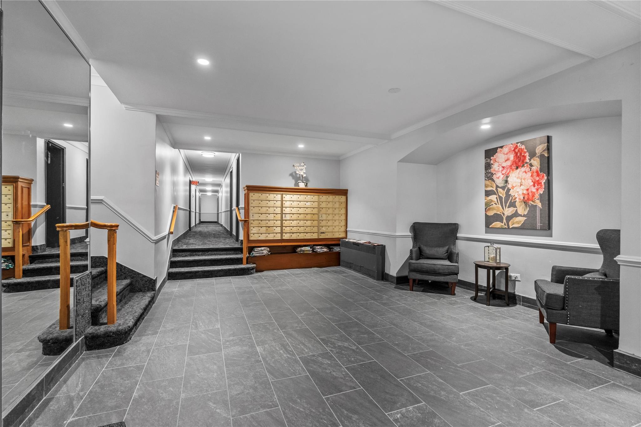 60 Locust Avenue, Unit 610 New Rochelle, NY 10801 - Photo 2 of 22 a living room with furniture gym equipment and a flat screen tv