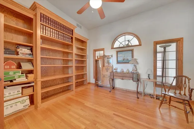 a view of a livingroom with furniture and a window
