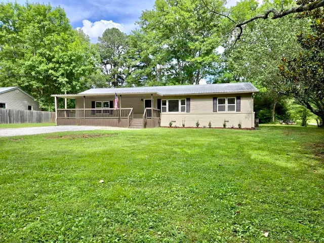 a house view with a garden space