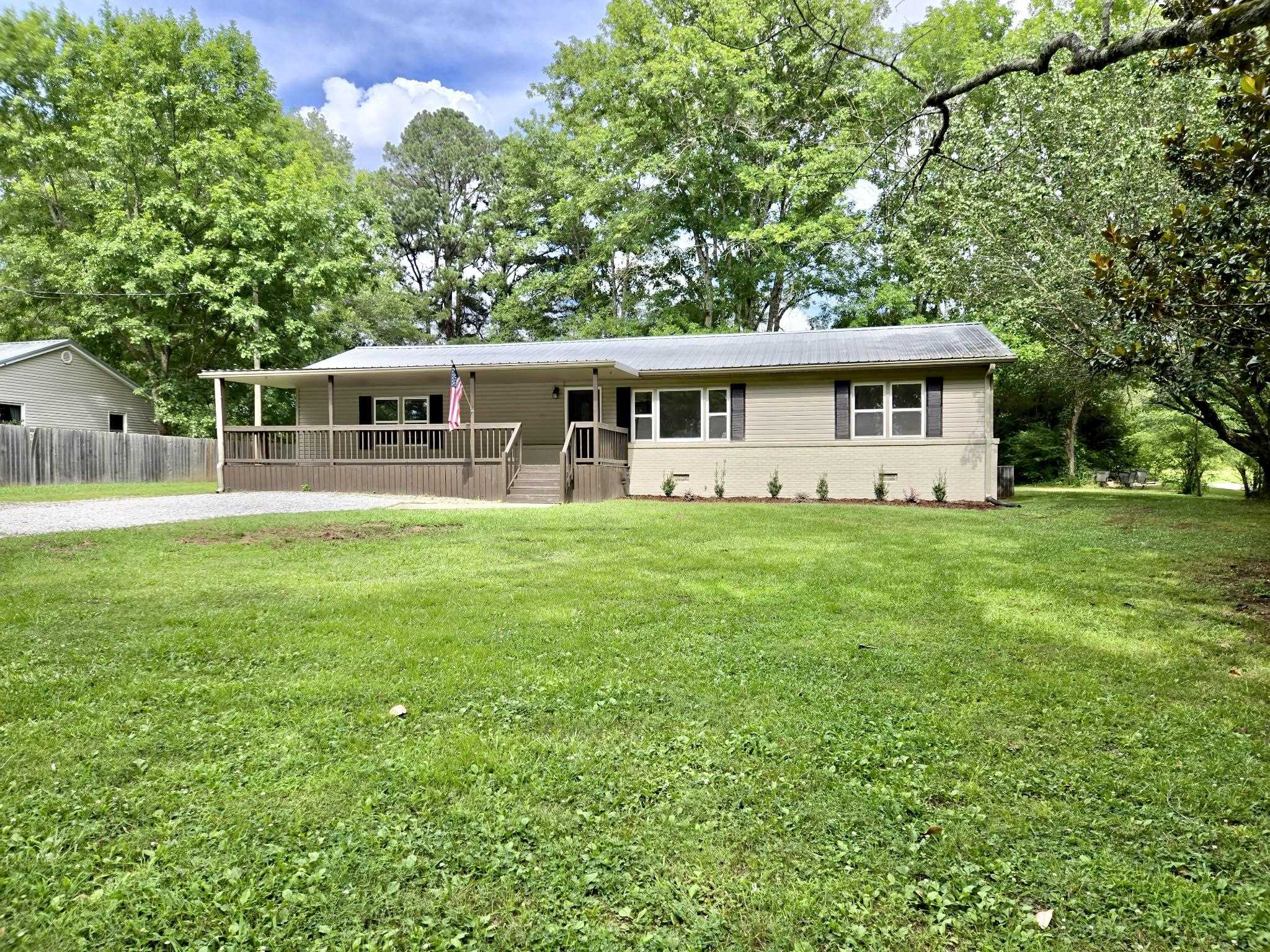 a house view with a garden space