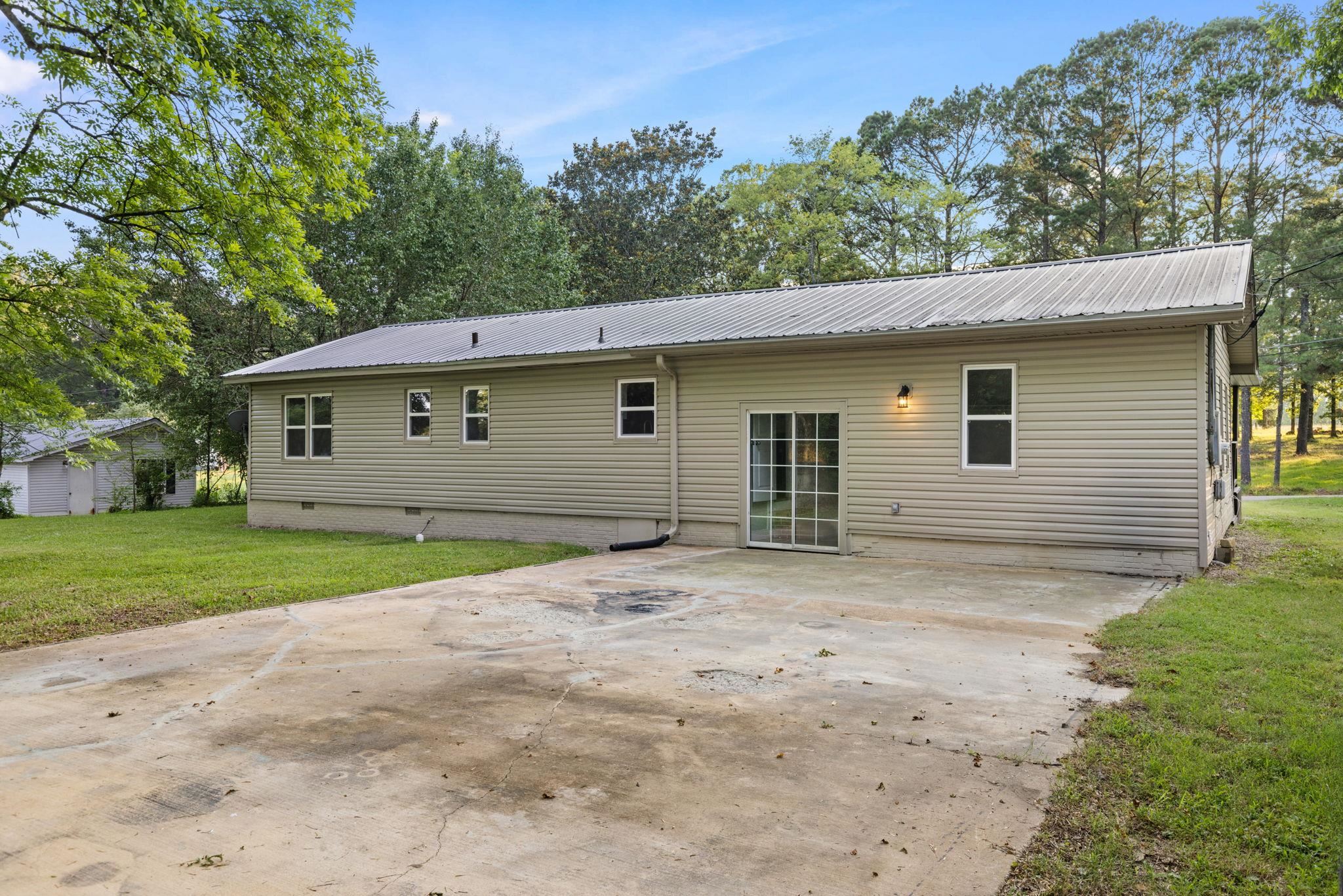 505 Mckewen Road Corinth, MS 38834 - Photo 22 of 39 a house with trees in the background