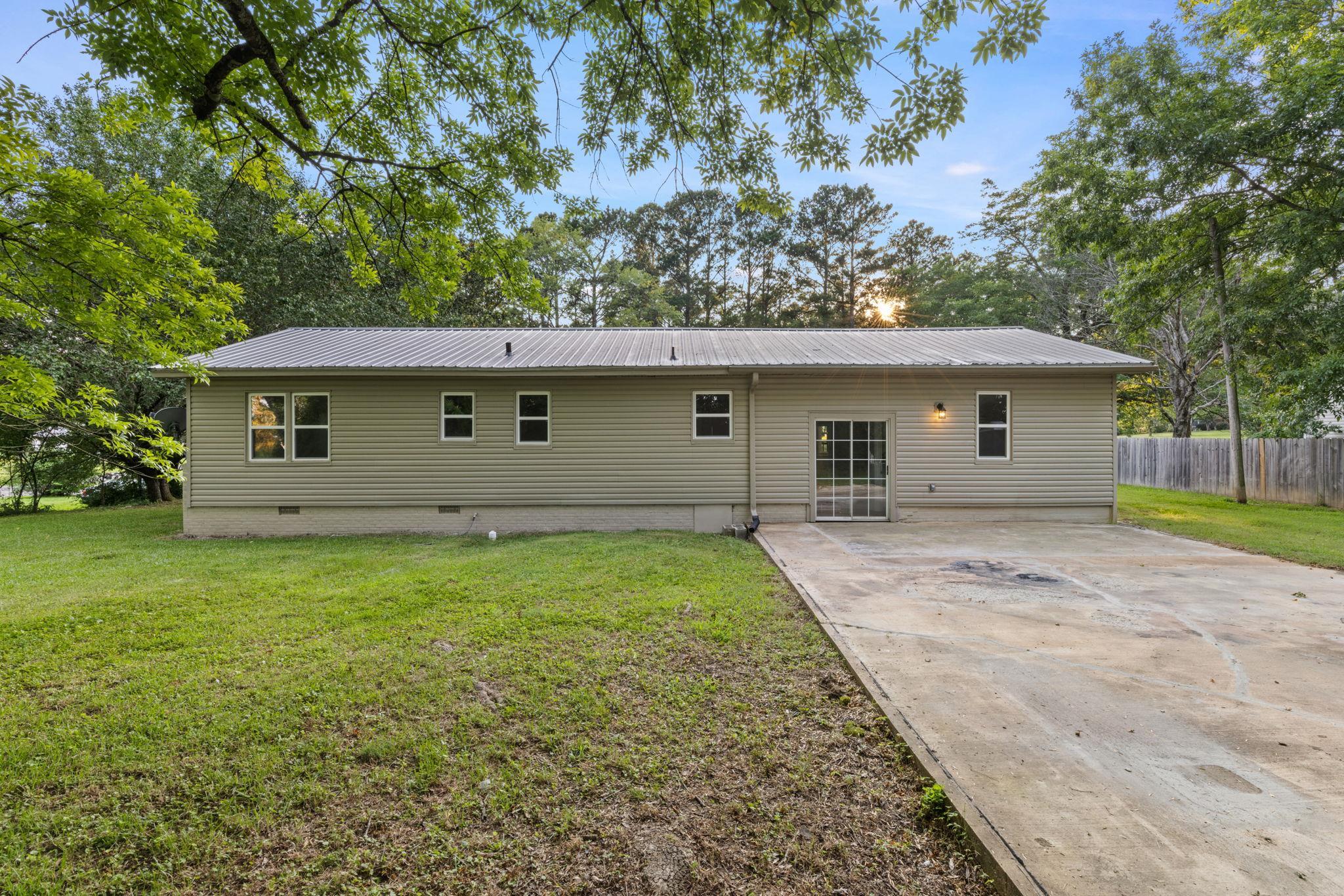 505 Mckewen Road Corinth, MS 38834 - Photo 23 of 39 a front view of a house with garden