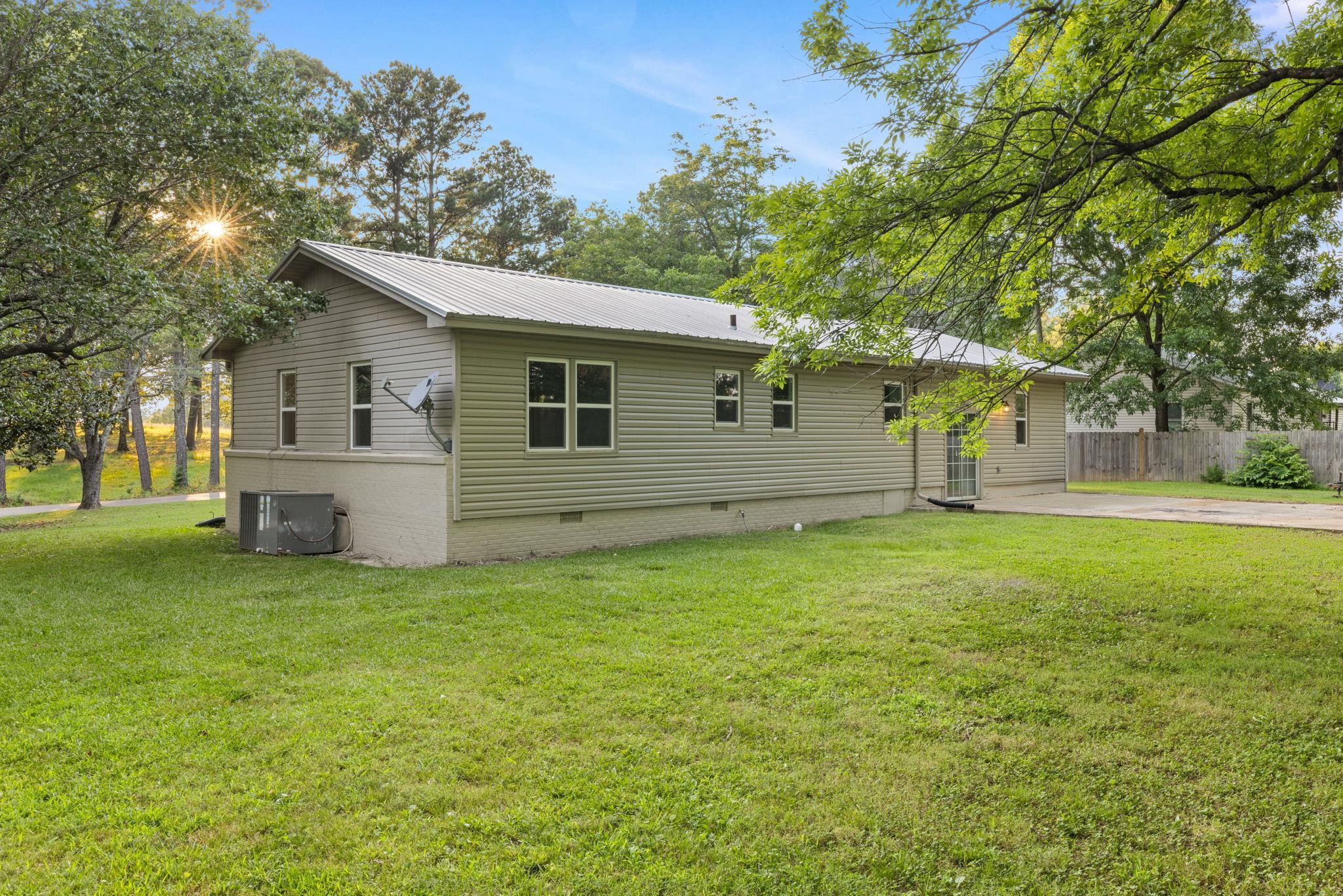 505 Mckewen Road Corinth, MS 38834 - Photo 24 of 39 a view of a house with a backyard