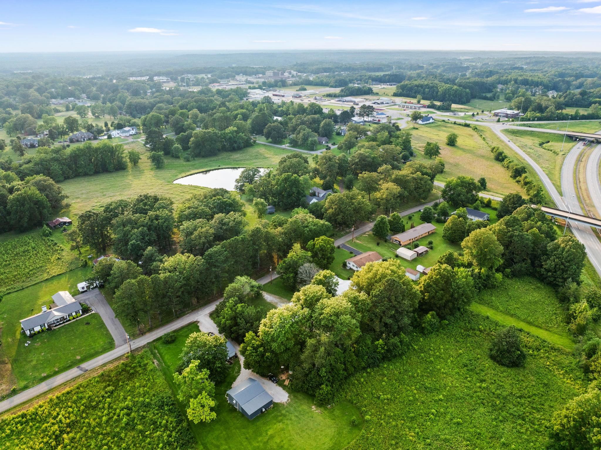 505 Mckewen Road Corinth, MS 38834 - Photo 30 of 39 a view of a lake with a city