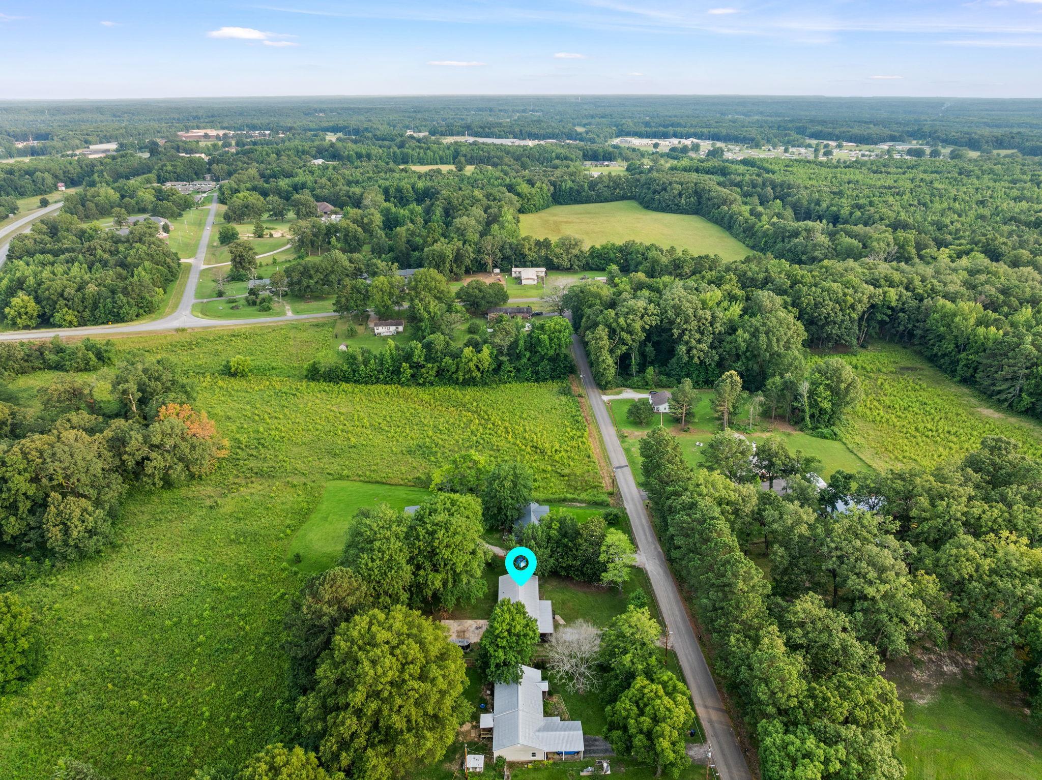 505 Mckewen Road Corinth, MS 38834 - Photo 39 of 39 an aerial view of residential houses with outdoor space and trees