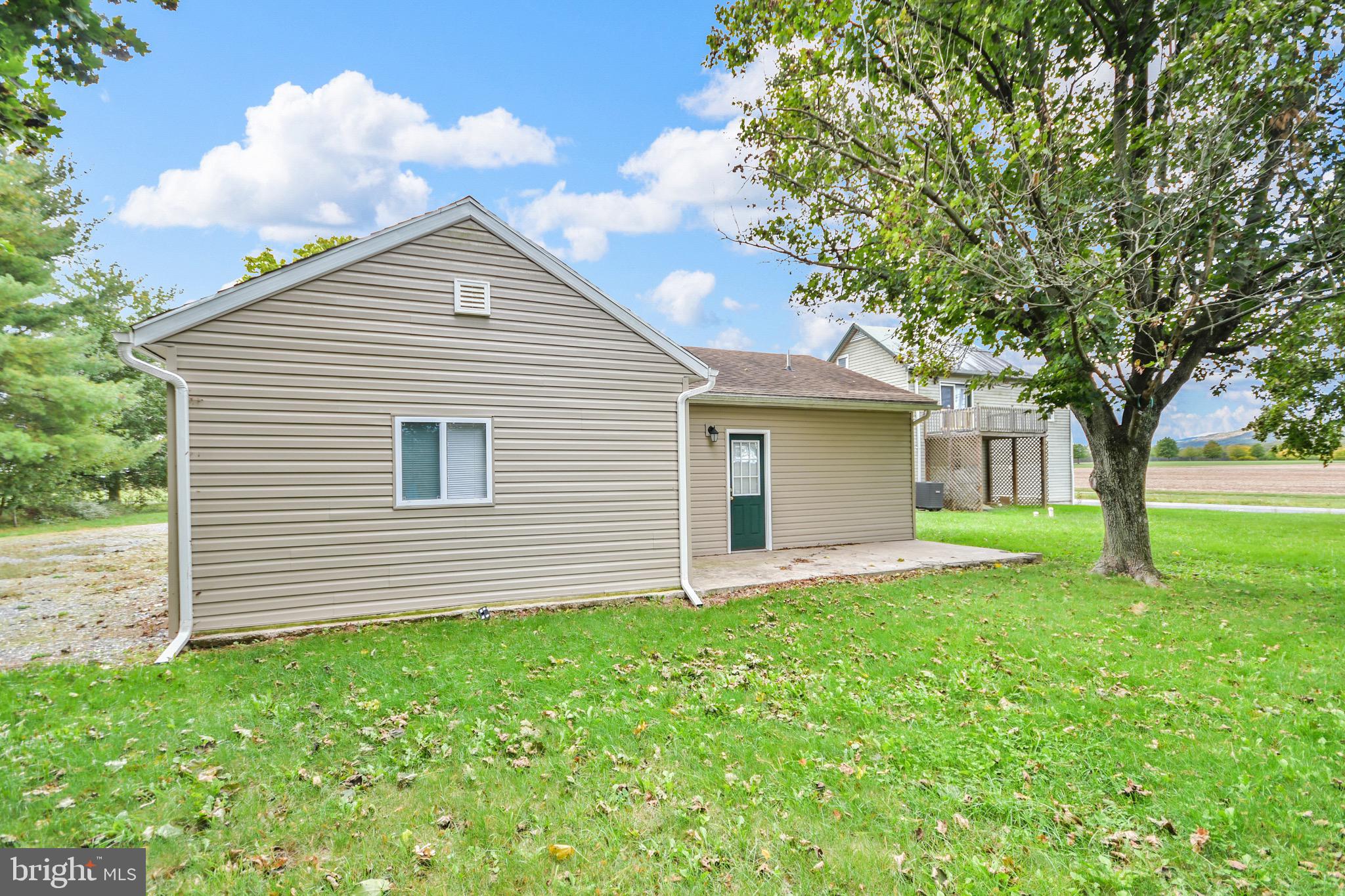 9604 Dry Bridge Road Emmitsburg, MD 21727 - Photo 7 of 11 a view of a house with a backyard