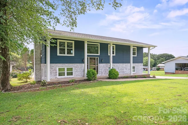 front view of a house with a yard