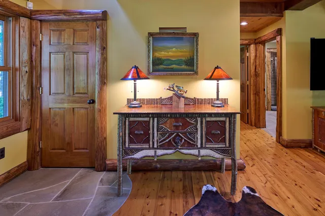 a view of a livingroom with furniture and wooden floor