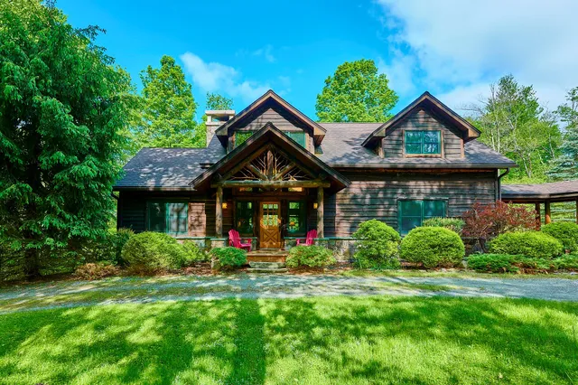 a front view of house with garden