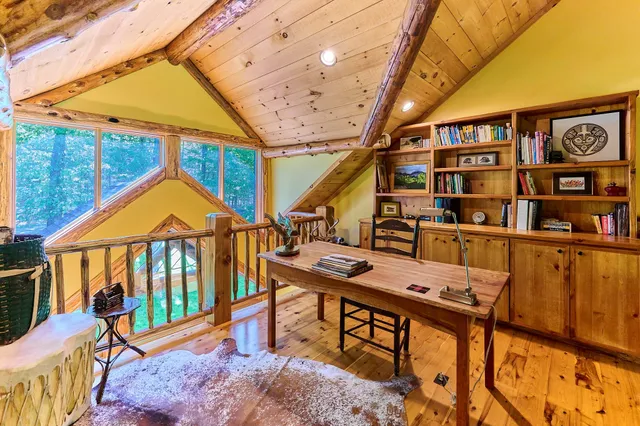 a view of a terrace with furniture and wooden deck