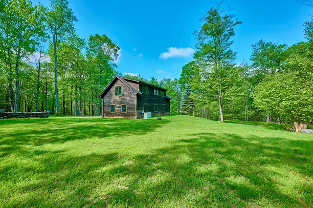 a house view with a garden space