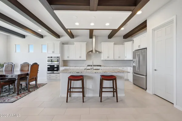 a bedroom with bed and a window