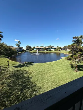 a view of a lake with a city view