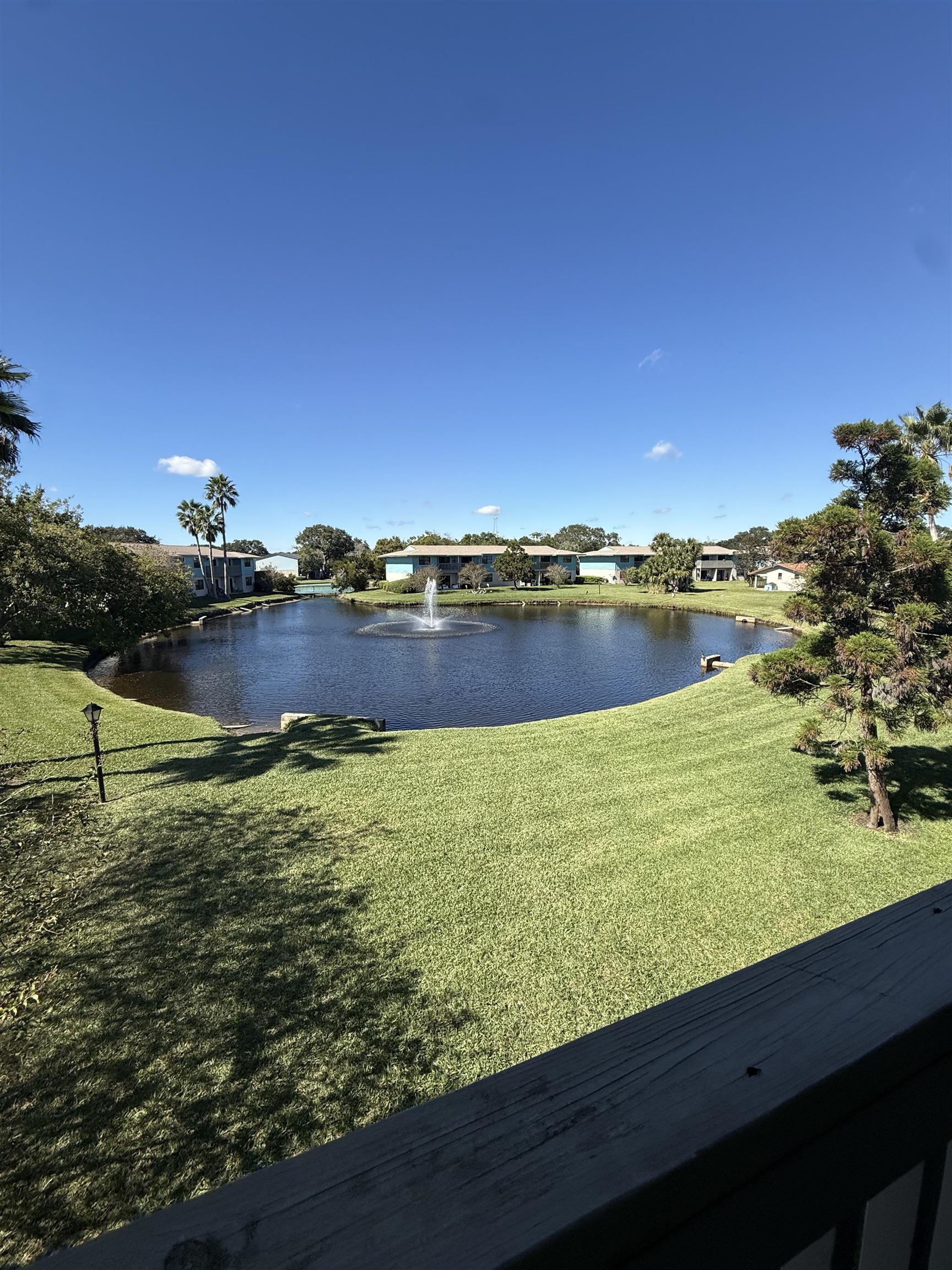 650 West Pope Road, Unit 225 St. Augustine, FL 32080 - Photo 20 of 21 a view of a lake with a city view