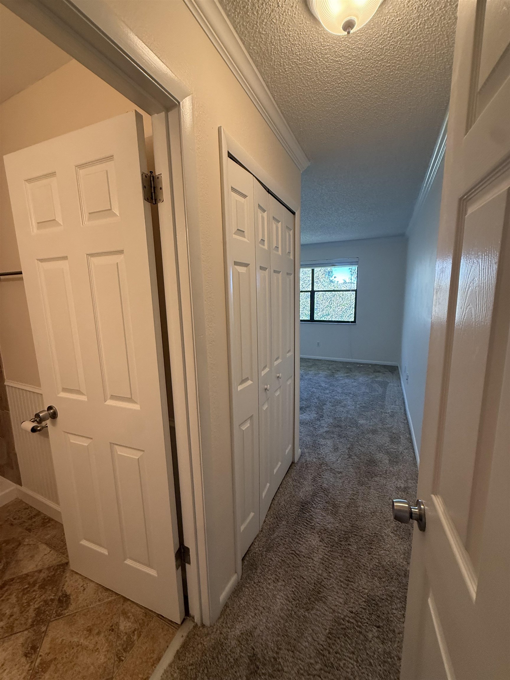 650 West Pope Road, Unit 225 St. Augustine, FL 32080 - Photo 9 of 21 a view of a hallway with closet area