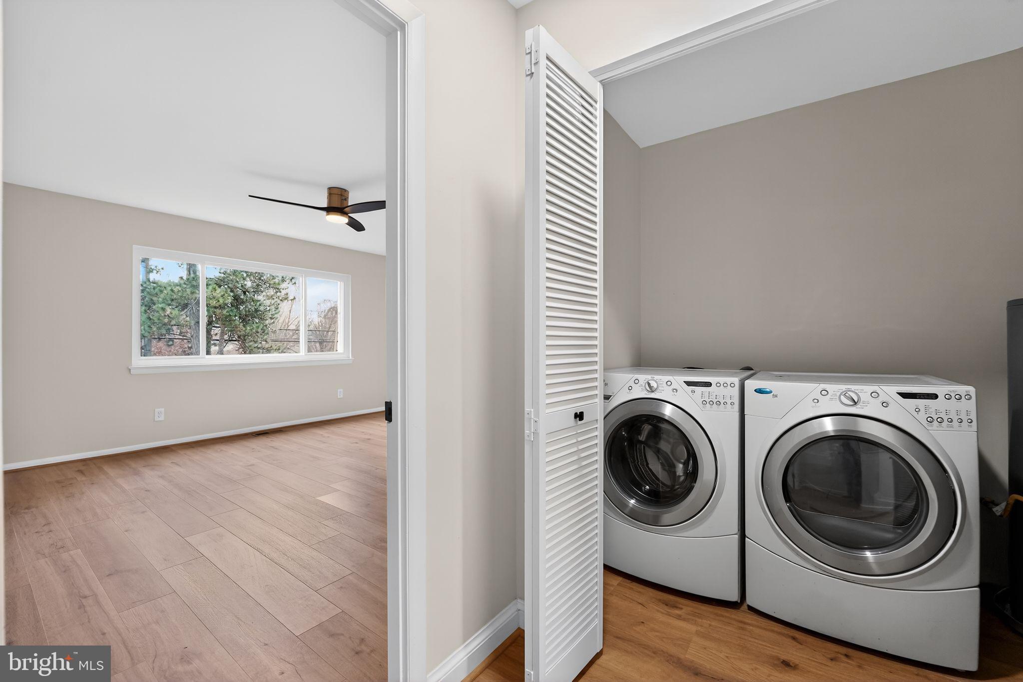 7344 Park Heights Avenue Baltimore, MD 21208 - Photo 31 of 33 a view of a bedroom with washer and dryer