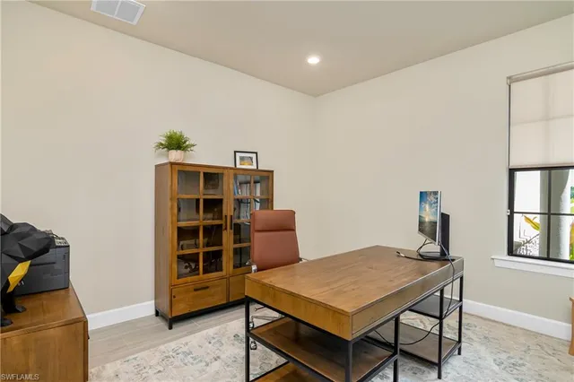 a room with furniture and window