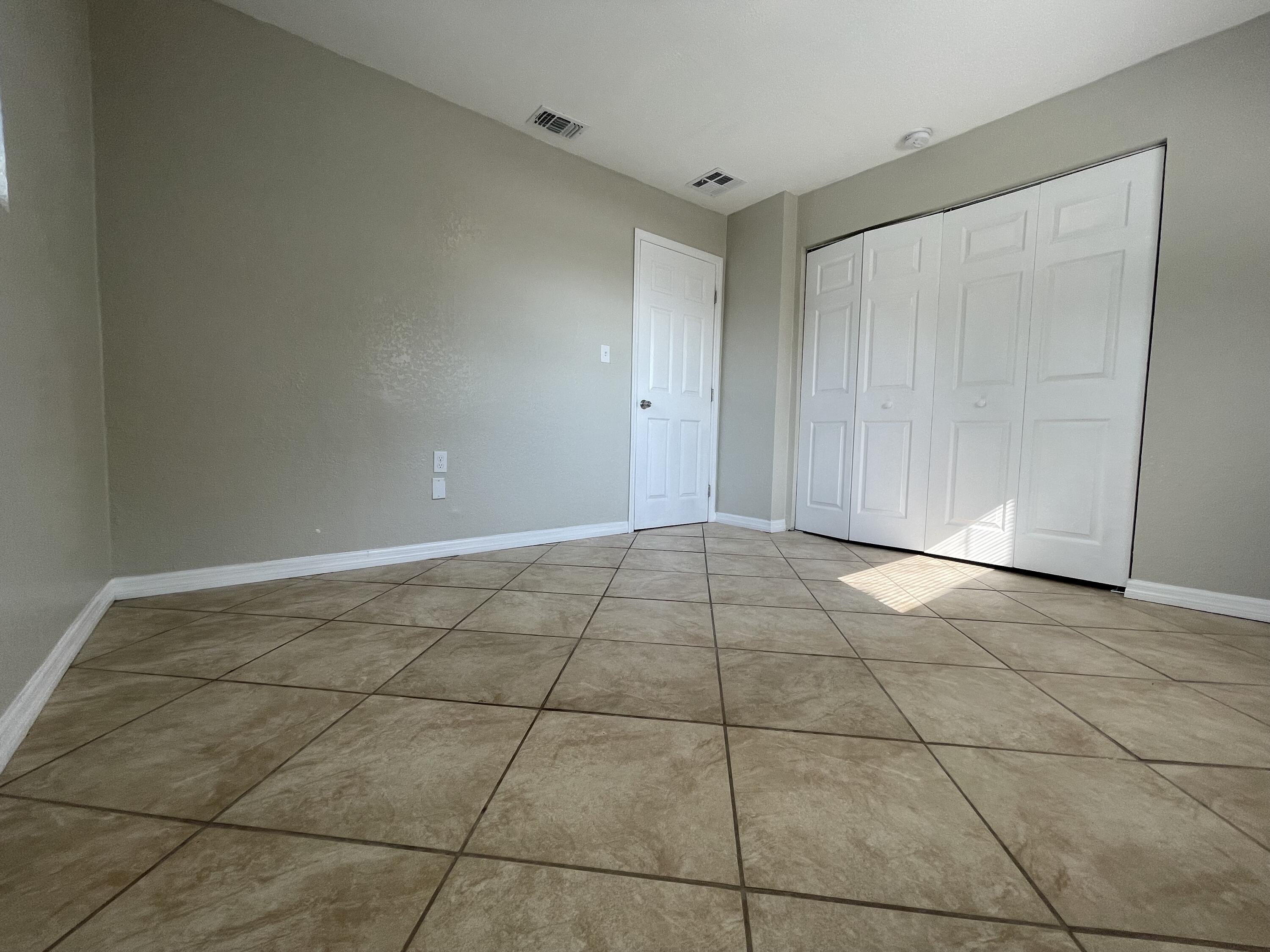 2880 Harson Way Fort Pierce, FL 34946 - Photo 37 of 40 a view of an empty room with a window