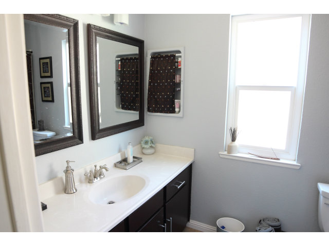 74 Redding Road Campbell, CA 95008 - Photo 13 of 21 a bathroom with a sink vanity and a mirror